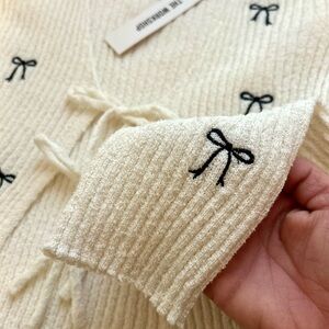 Sexy sweet tie-front knit top or cardigan sweater with Black Bow Accents